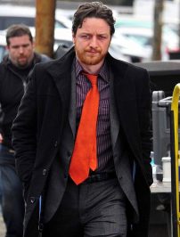 An image of James McAvoy walking towards the camera as his character in Filth